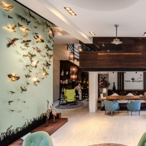 The Aviary Hotel Lobby with Victoria Brooke bird art installation